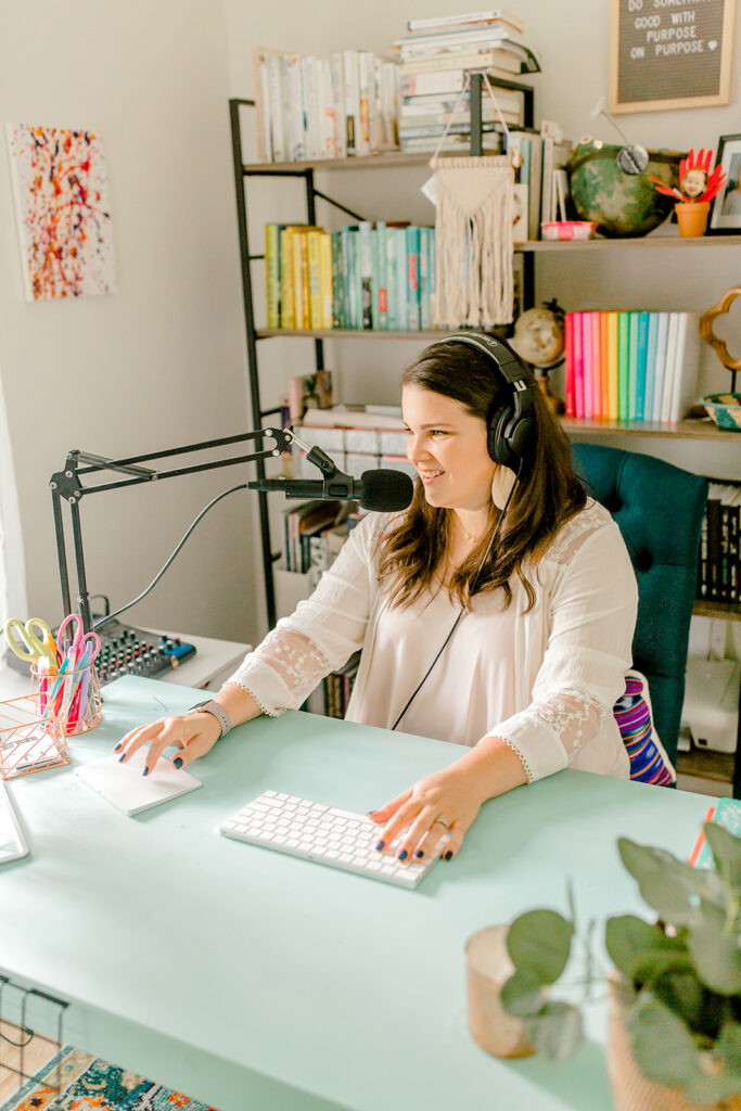 Fashion and lifestyle blogger Molly Stillman podcasting.